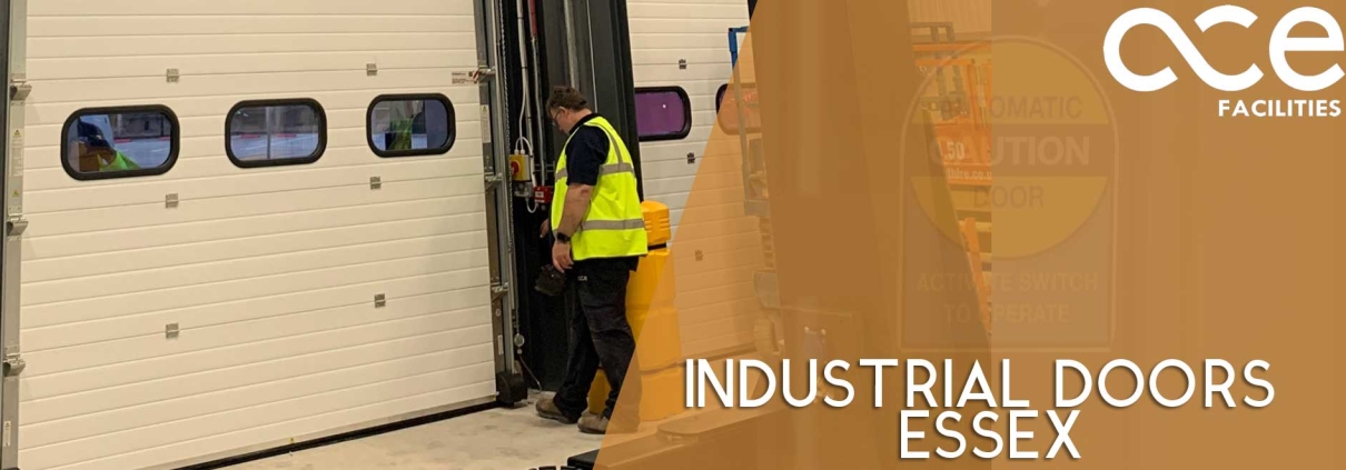 Industrial doors Essex. ACE engineer servicing and repairing a sectional type industrial door