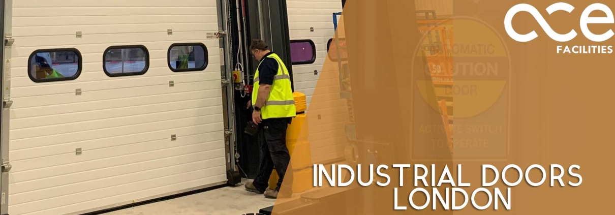 Industrial doors London. ACE engineer servicing and repairing a sectional type industrial door